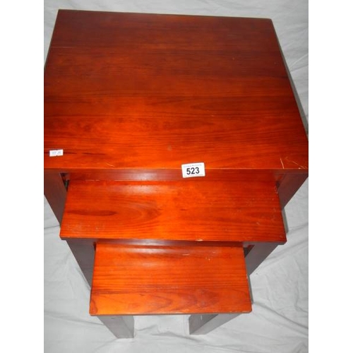 523 - A nest of 3 mahogany tables in good condition.