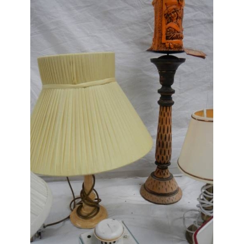 524 - 6 table lamps, a carriage candle holder and a new Novalum shimmering candle with stand.