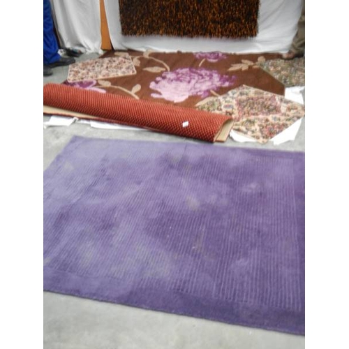 525 - 7 rugs in good condition, Brown, purple flowers 205 x 145 cm, Red dot 130 x 170 cm, Purple 140 x 160... 