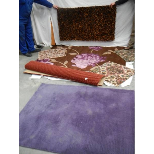 525 - 7 rugs in good condition, Brown, purple flowers 205 x 145 cm, Red dot 130 x 170 cm, Purple 140 x 160... 