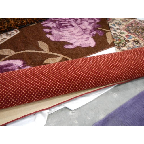 525 - 7 rugs in good condition, Brown, purple flowers 205 x 145 cm, Red dot 130 x 170 cm, Purple 140 x 160... 