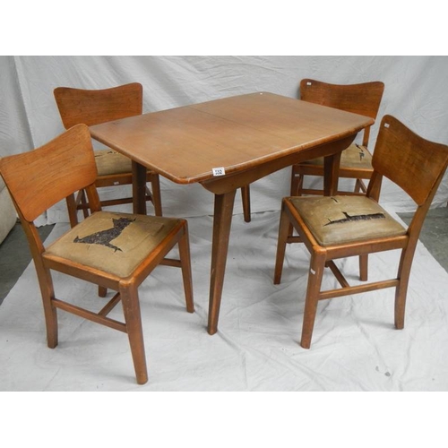 532 - An Ercol style extending table with 4 chairs in need of restoration, 175 x 74 cm x 175 cm high.