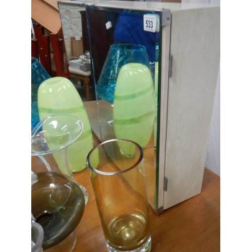 533 - A 4 shelf bathroom mirror (78 x 48 x 14 cm) and 8 pieces of coloured glass including decanter.