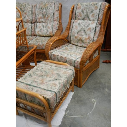 540 - A cane/whicker 7 piece suite with cushions.