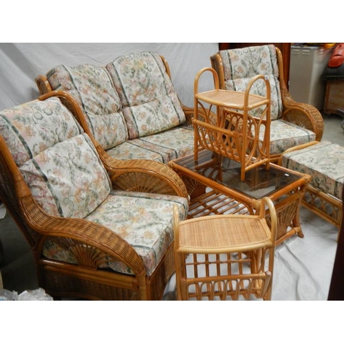 540 - A cane/whicker 7 piece suite with cushions.