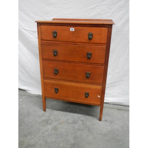 548 - A 4 drawer oak chest, H 107 cm, W 75 cm, D 43 cm.