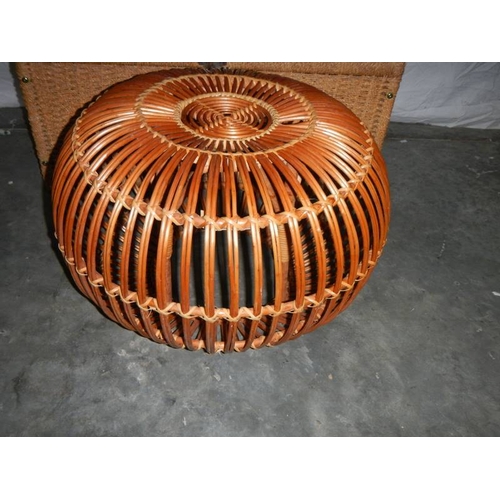 550 - A circular wicker table 63 cm diameter x 40 cm high and a rattan blanket box with hinged lid L 85 cm... 