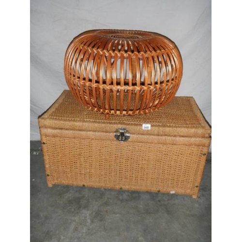 550 - A circular wicker table 63 cm diameter x 40 cm high and a rattan blanket box with hinged lid L 85 cm... 