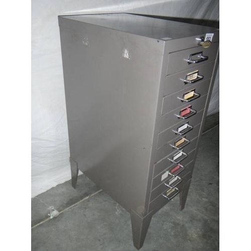 553 - A fine 10 drawer metal cabinet in gun metal grey with key, 72 x 42 x 29 cm.