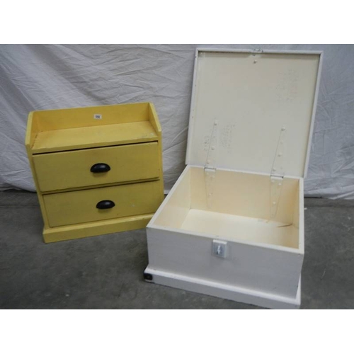 556 - A 2 drawer pine shelf unit in yellow and a pine chest in white.