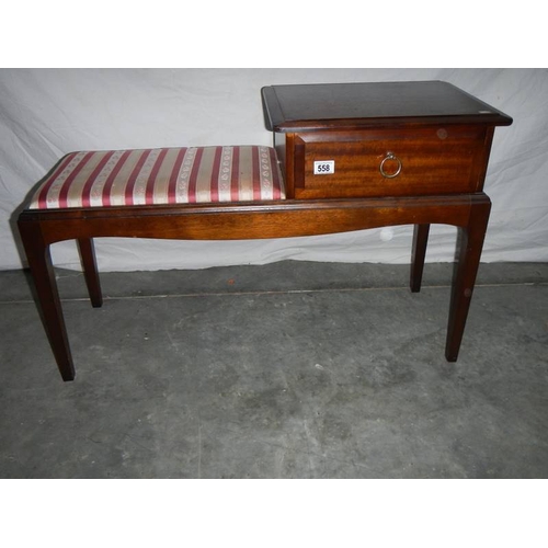 558 - A good red stripe telephone seat in good condition.