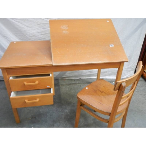 562 - An unusual office desk with 2 drawers, lift up writing slope and chair, 115 x 60 x 72 cm.