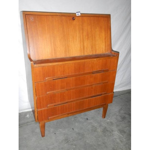 563 - A teak desk in good condition for age, 81 x 40 x 108 cm.