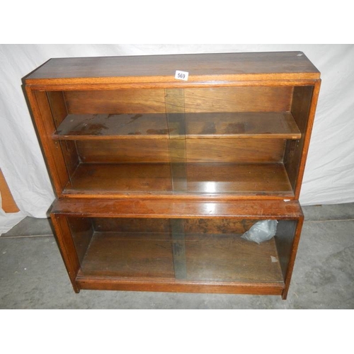 569 - A Wernick style glass fronted book case, H 71, W 53, D 47 cm.