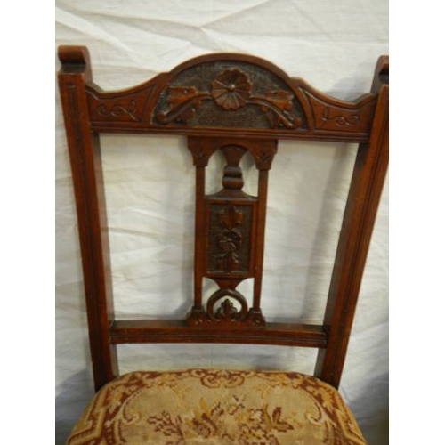 571 - A set of 4 Edwardian dining chairs.