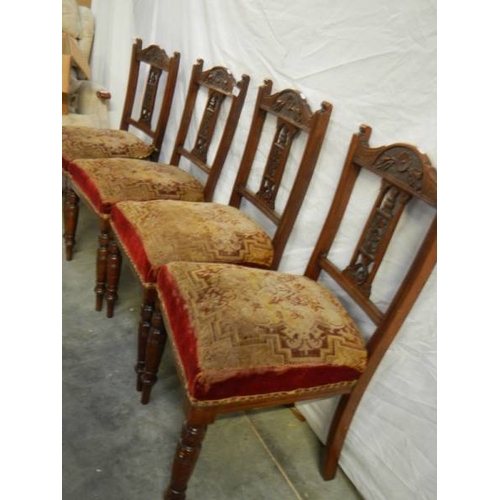 571 - A set of 4 Edwardian dining chairs.