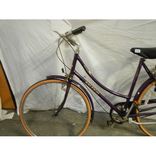 575 - A Raleigh ladies bicycle in purple, 3 speed ''Sturmey Archer'' with alloy back rack and alloy side s... 