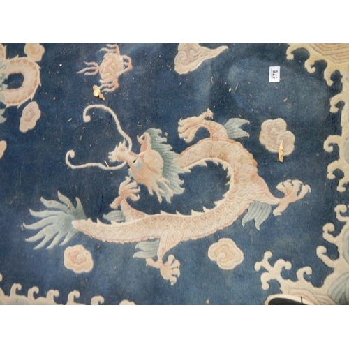 576 - A 5 dragon plush carpet in good condition but needs a clean, approximately 2 x 3 m.