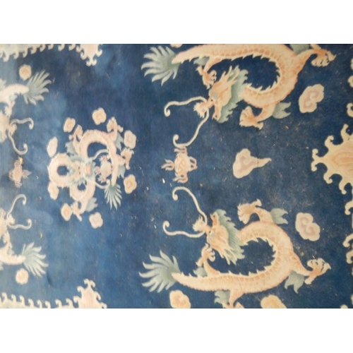 576 - A 5 dragon plush carpet in good condition but needs a clean, approximately 2 x 3 m.