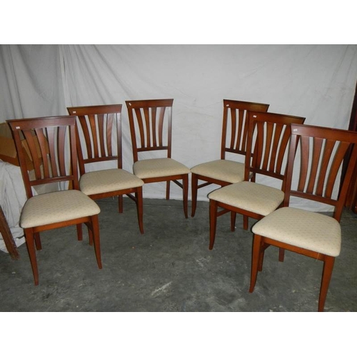 582 - 6 good quality Nathan style dining chair with beige spotted seats.