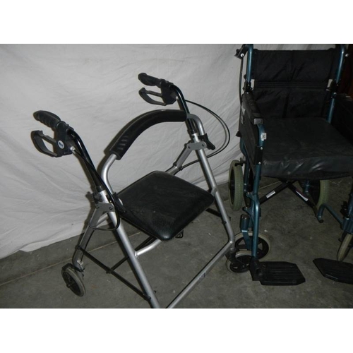 583 - A ''Dav's'' folding wheelchair with foot rests and a walking aid.