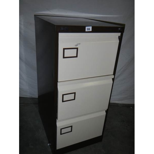 586 - A 3 drawer filing cabinet.