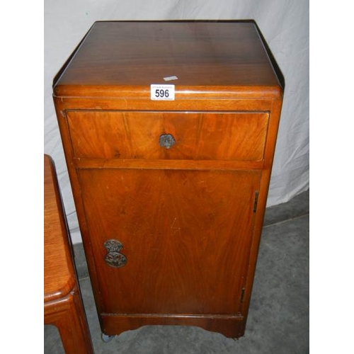 596 - A sliding door cabinet on wheels, a 1930's bedside cabinet and a G plan table.