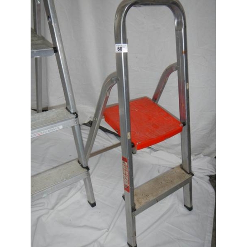 607 - A two step and a three step aluminium ladder.