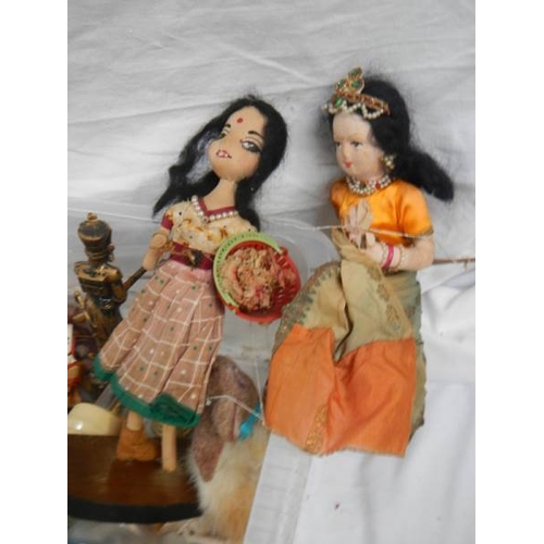 608 - A good collection of dolls/animals/ornaments etc.,