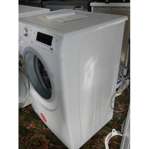 613 - A Hoover Dyno 7164 Dix 7kg, 1600 rpm washing machine with 'Intelligent Sensor' with instruction book... 