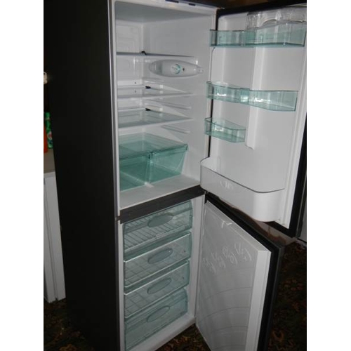 616 - A very clean Hotpoint R134A fridge freezer, 165cm tall x 55cm wide.