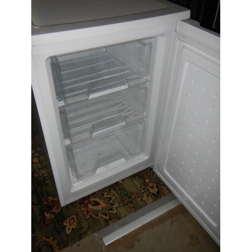 617 - A Curry's essential 3 drawer freezer, Model COF55 W12. 83.5 cm tall x 55 cm wide.