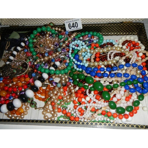 640 - A mixed lot of old necklaces etc.