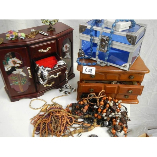 648 - A quantity of jewellery boxes and jewellery.