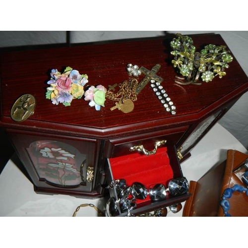 648 - A quantity of jewellery boxes and jewellery.