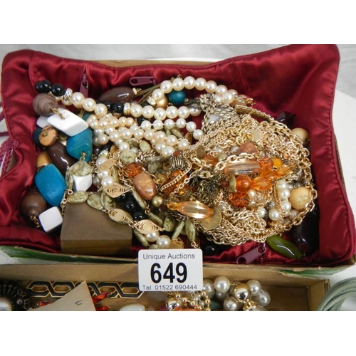 649 - 2 trays of costume jewellery.