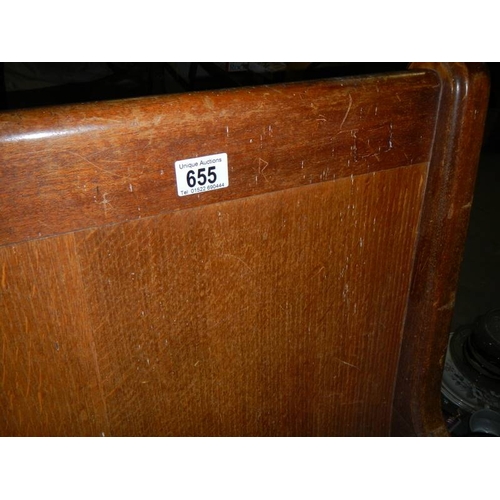 655 - A long old church pew, Approximately 210 cm wide.