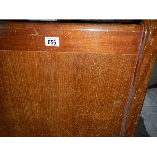 656 - A long old church pew, approximately 210 cm wide.