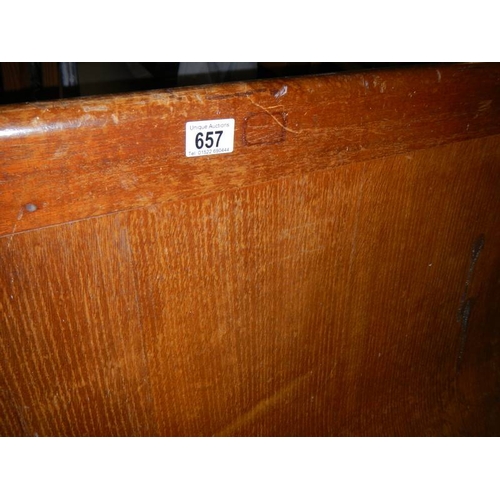 657 - A long old church pew, approximately 210 cm wide.