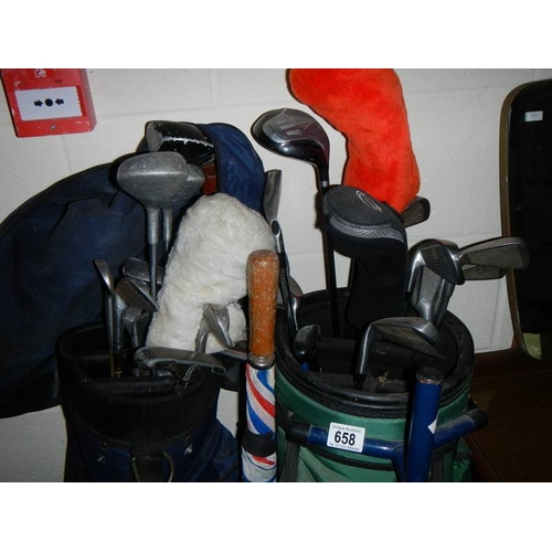 658 - 2 lots of good golf clubs.