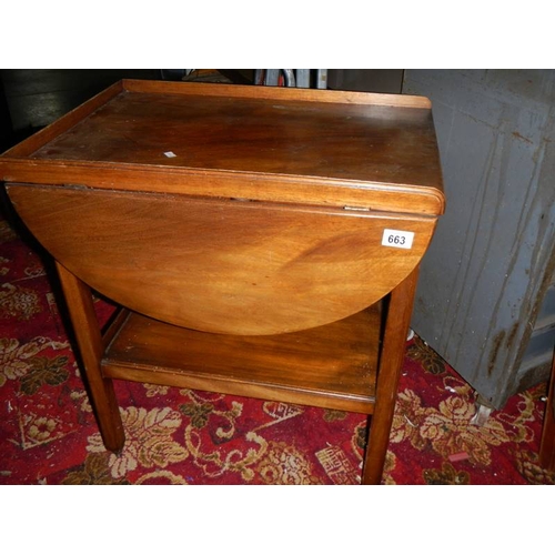 663 - A good mahogany drop leaf trolley with mahogany gallery.