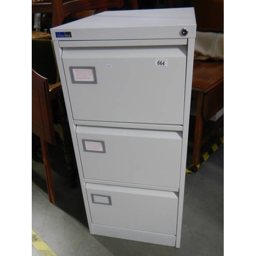 664 - A good clean three drawer filing cabinet.