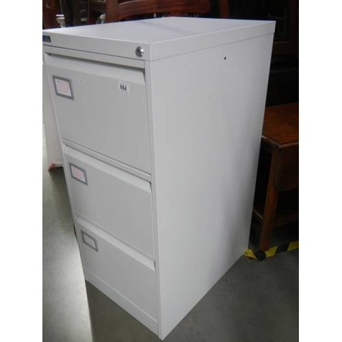 664 - A good clean three drawer filing cabinet.