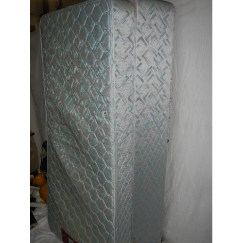 668 - A single bed base and mattress in good condition, 92 x 190 cm.