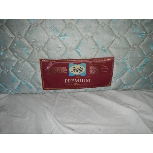 668 - A single bed base and mattress in good condition, 92 x 190 cm.