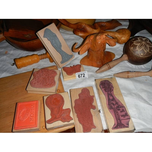 672 - A mixed lot of wooden items including 1920's book rack, printing blocks, bowl, vase etc.,