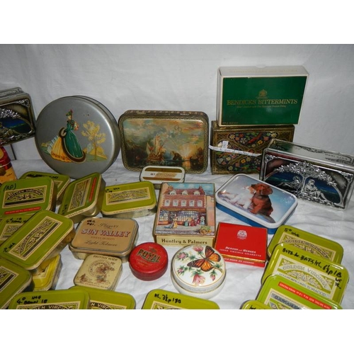 673 - A good mixed lot of old tins including round blue musical powder tin.