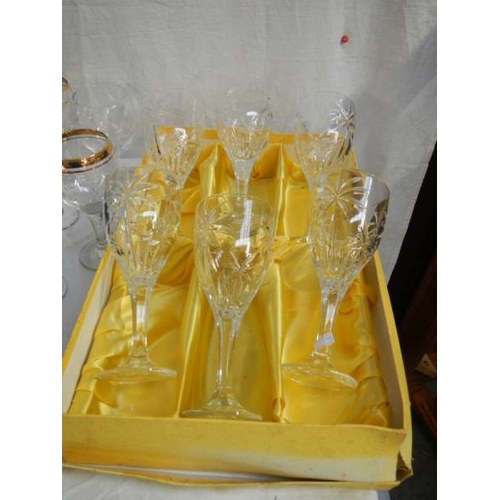 675 - 3 good sets of drinking glasses including set of 6 but only 5 are gilded.