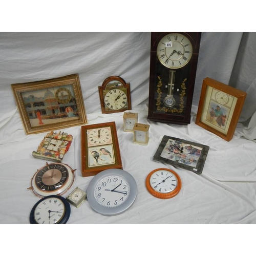 676 - 14 assorted wall clocks.