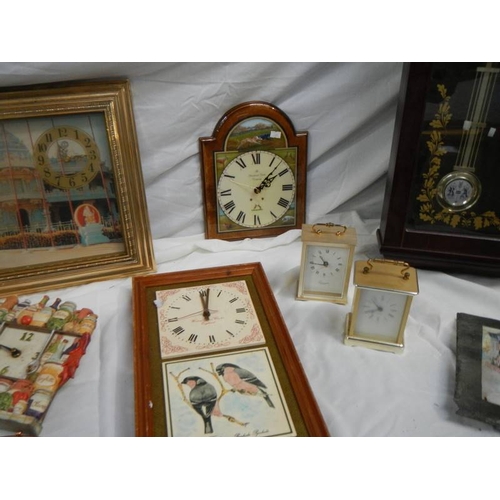 676 - 14 assorted wall clocks.